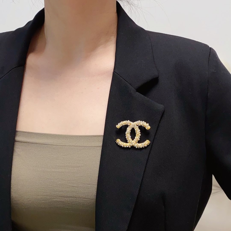 Ch**el brooches